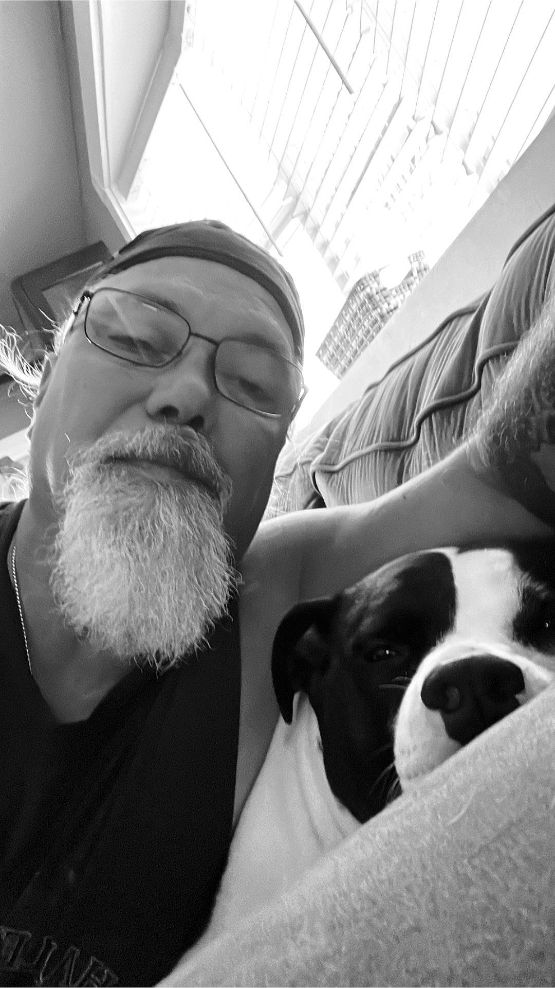 Dixie is registered to the contest to win money with this photo: beard, black, black_and_white, carnivore, comfort, companion_dog, cool, dog, dog_breed, eyewear, facial_hair, glasses, human, monochrome, monochrome_photography, organ, snapshot, style, vision_care, white