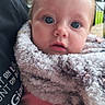 baby, infant, child, portrait, face, wide_eyes, blue_eyes, blond_hair, fluffy_blanket, blanket, wrapped, sitting, close_up, outdoor, window, adult, shirt, cuddling, curious, adorable