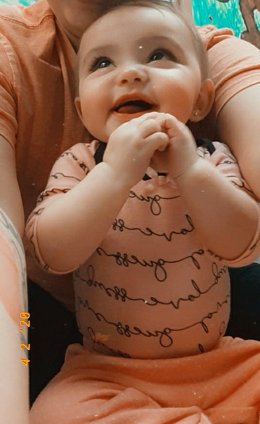 Nova Lynn is registered to the contest to win money with this photo: baby, cheek, child, face, finger, hand, mouth, nail, person, toddler
