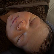 Gianni joined the competition — help win amazing prizes! baby, sleeping, infant, face, blanket, closeup, cozy, soft_lighting, peaceful, child, newborn, portrait, young, resting, indoors, warm, skin, head, eyelashes, peace
