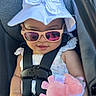 Tenyang joined the competition — help win amazing prizes! baby, child, infant, car_seat, sunglasses, sun_hat, smiling, portrait, seated, seatbelt, harness, plush_toy, pink_toy, vehicle, car_interior, sunlight, outdoor_light, summer, fashion, safe_travel