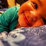 Trevell joined the competition — help win amazing prizes! baby, smile, face, close_up, blanket, blue, teal, clothing, infant, child, soft, warm_lighting, lying_down, happy, cozy, portrait, indoors, cute, expression, skin