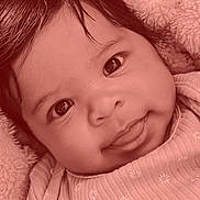 Kataliyah is registered to the contest to win money with this photo: baby, infant, face, eyes, tongue, smile, clothing, blanket, portrait, closeup, cute, child, person, indoors, cozy, lock_screen, time, date, phone_interface, happy