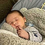 baby, sleeping, blanket, pacifier, cozy, infant, soft, clothing, cute, peaceful, face, hand, closeup, indoors, child, resting, portrait, warm, comfort, newborn