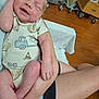Jaxson joined the competition — help win amazing prizes! newborn, baby, infant, smiling, onesie, clothing, arms, person, indoor, floor, wooden_floor, furniture, hospital, medical_equipment, legs, hand, happy, sleeping, cute, resting