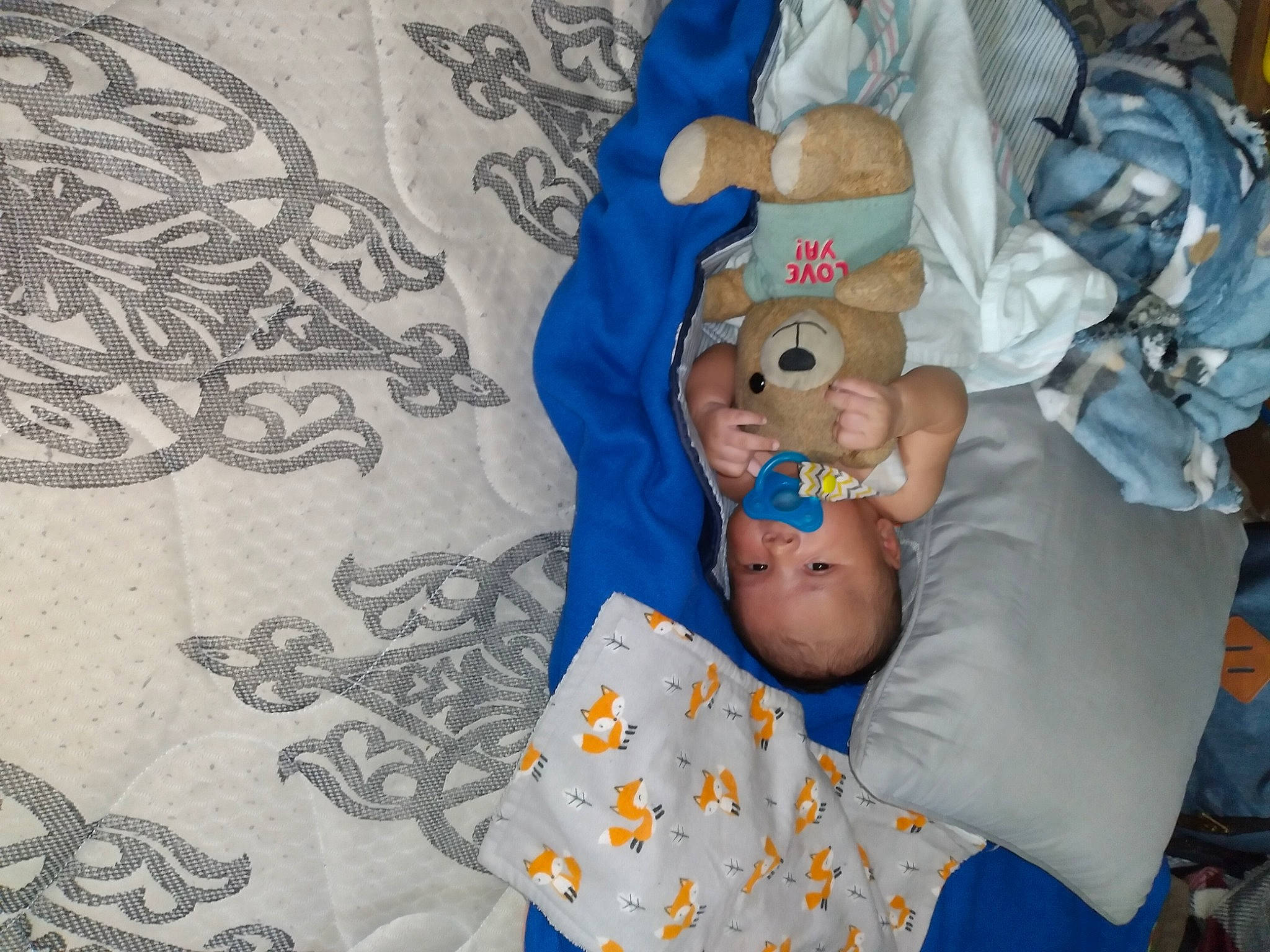 Leonidas joined the competition — help win amazing prizes! arm, art, baby, baby_products, blue, child, comfort, finger, hand, hat, linens, mammal, pattern, person, room, stuffed_toy, t_shirt, textile, toddler, toy