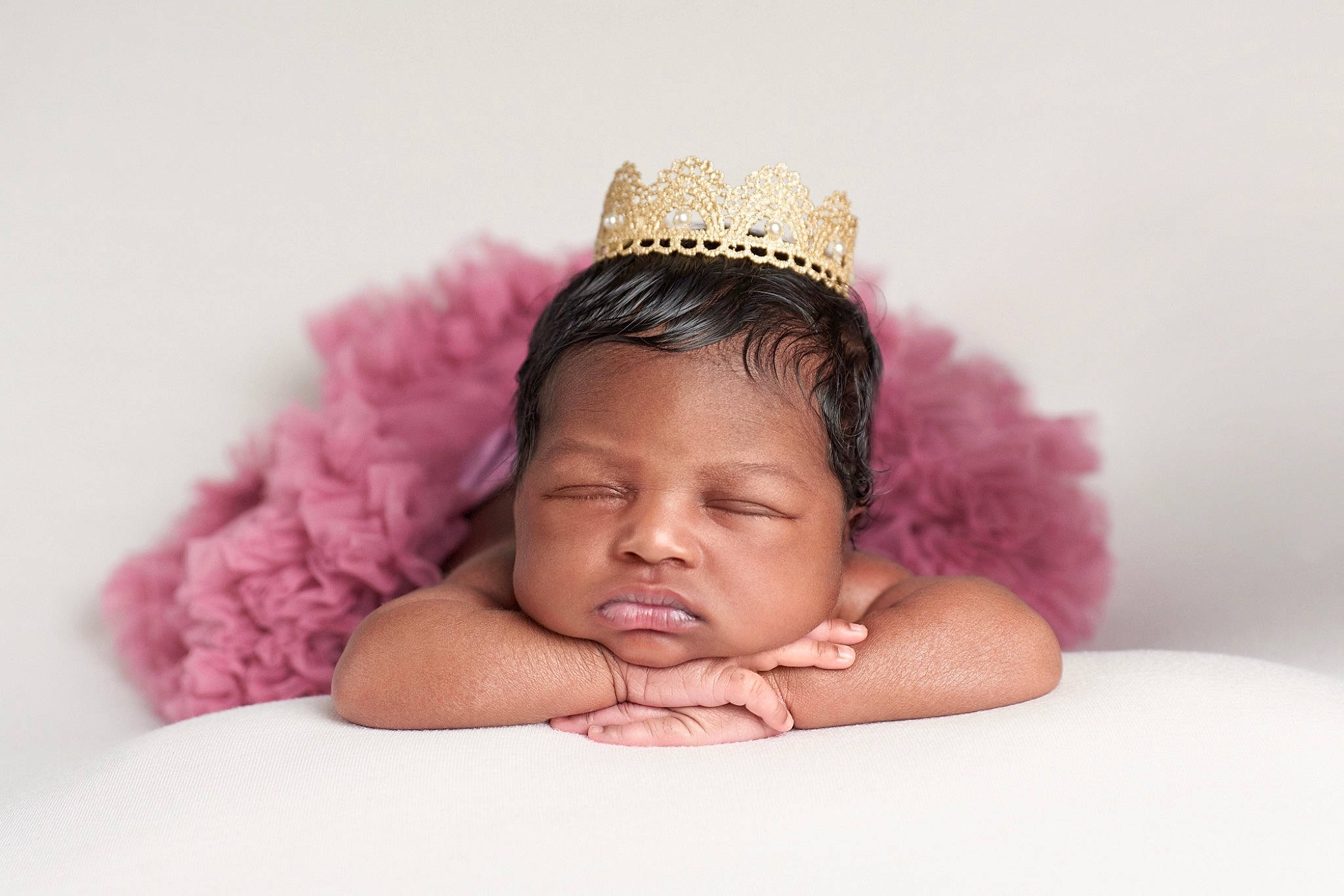 Aniyah is registered to the contest to win money with this photo: baby, baby_toddler_clothing, cap, costume_hat, ear, eyelash, face, finger, flash_photography, gesture, hair, hand, happy, head, headgear, headpiece, lip, person, petal, skin