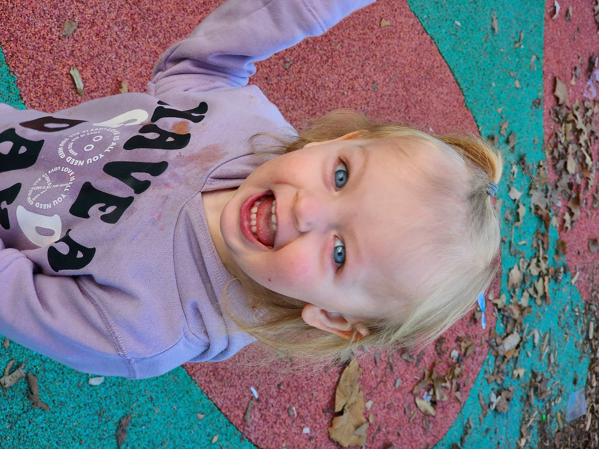 Emilia joined the competition — help win amazing prizes! cheek, chin, grass, happy, head, headgear, human_body, iris, leisure, lip, mouth, nose, people_in_nature, person, pink, plant, skin, smile, toddler, tree