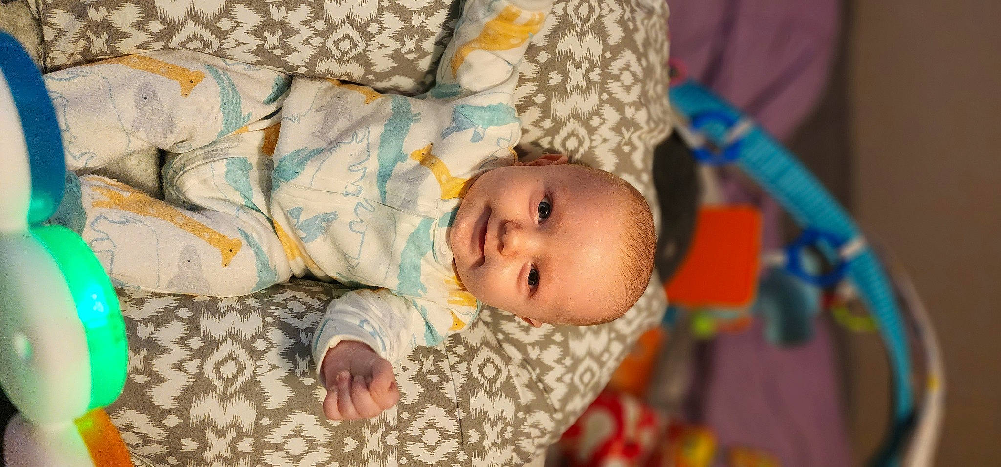 Luca joined the competition — help win amazing prizes! baby, baby_products, baby_toddler_clothing, cheek, child, comfort, couch, eye, face, happy, head, iris, linens, pattern, person, room, skin, smile, toddler, tree