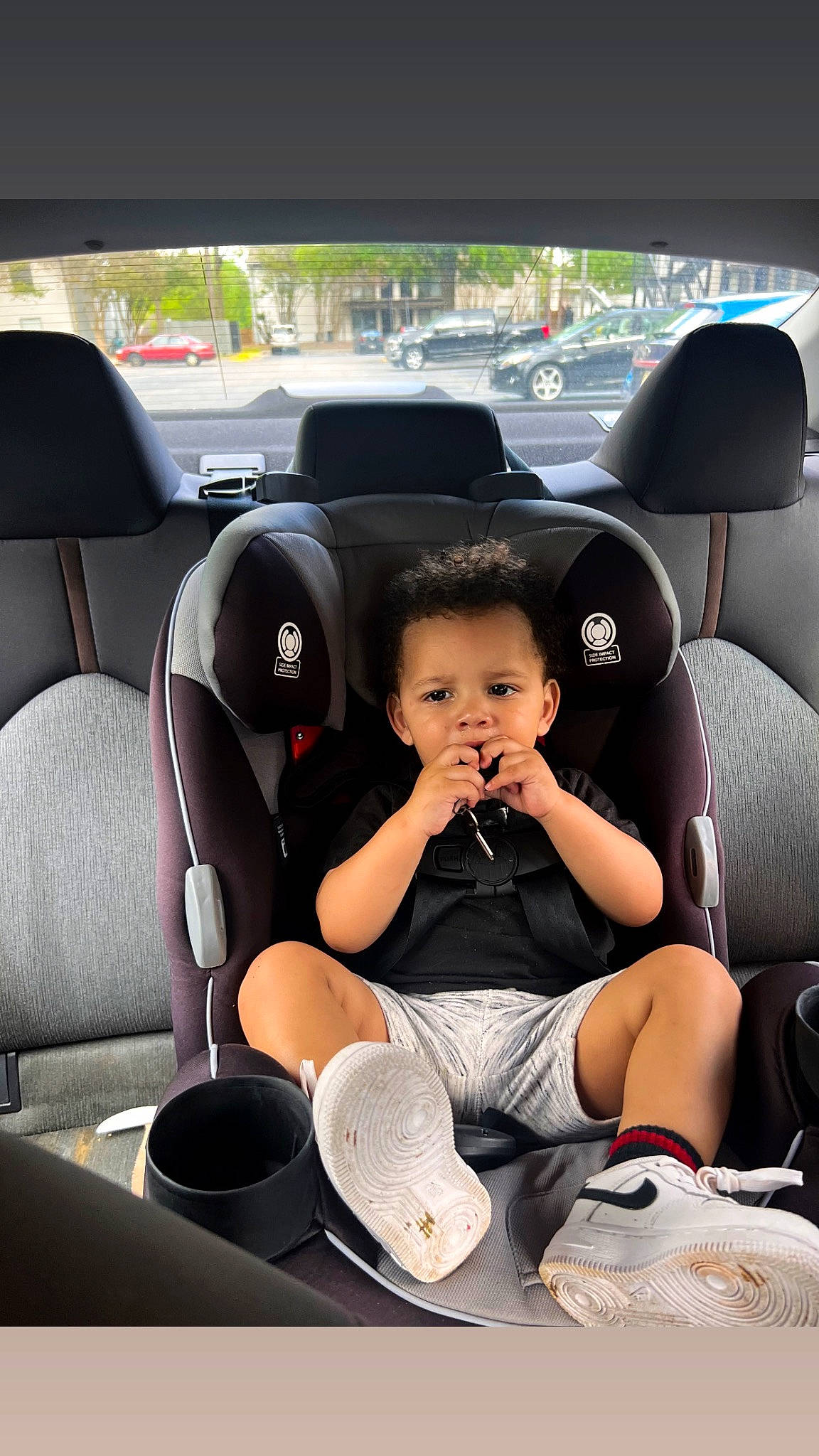 Kabir is registered to the contest to win money with this photo: auto_part, automotive_design, automotive_exterior, automotive_tire, car, car_seat, car_seat_cover, comfort, hat, head_restraint, leg, motor_vehicle, person, personal_luxury_car, plant, steering_part, steering_wheel, toddler, vehicle, vehicle_door