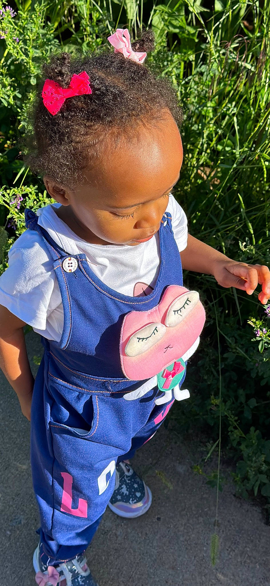 Mariah joined the competition — help win amazing prizes! baby, baby_toddler_clothing, carmine, child, cool, electric_blue, facial_expression, fashion_accessory, fun, grass, hairstyle, happy, person, personal_protective_equipment, pink, plant, summer, t_shirt, toddler, toy