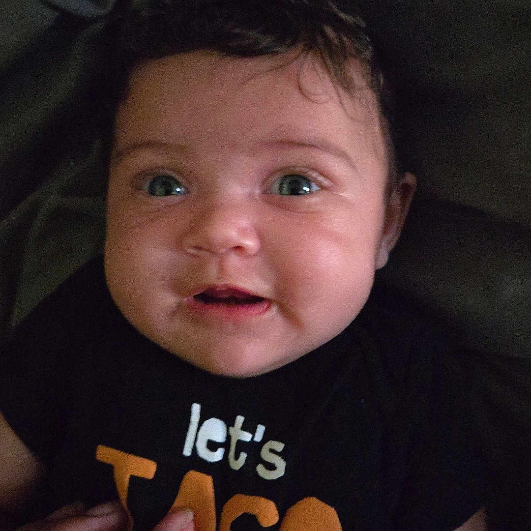 Emerald joined the competition — help win amazing prizes! baby, bodypart, clothing, couch, face, finger, frown, furniture, hand, happy, head, mouth, newborn, person, photography, portrait, sad, selfie, smile, t_shirt