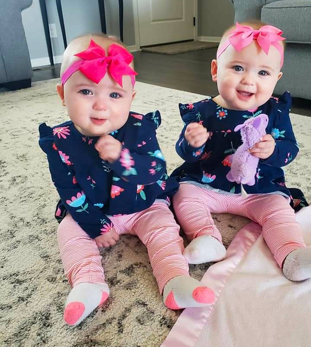 Kate And Avah is registered to the contest to win money with this photo: baby, baby_laughing, baby_products, baby_toddler_clothing, cabinetry, cheek, child, eye, face, hair_accessory, head, headwear, human, human_body, joy, magenta, mouth, nose, person, pink