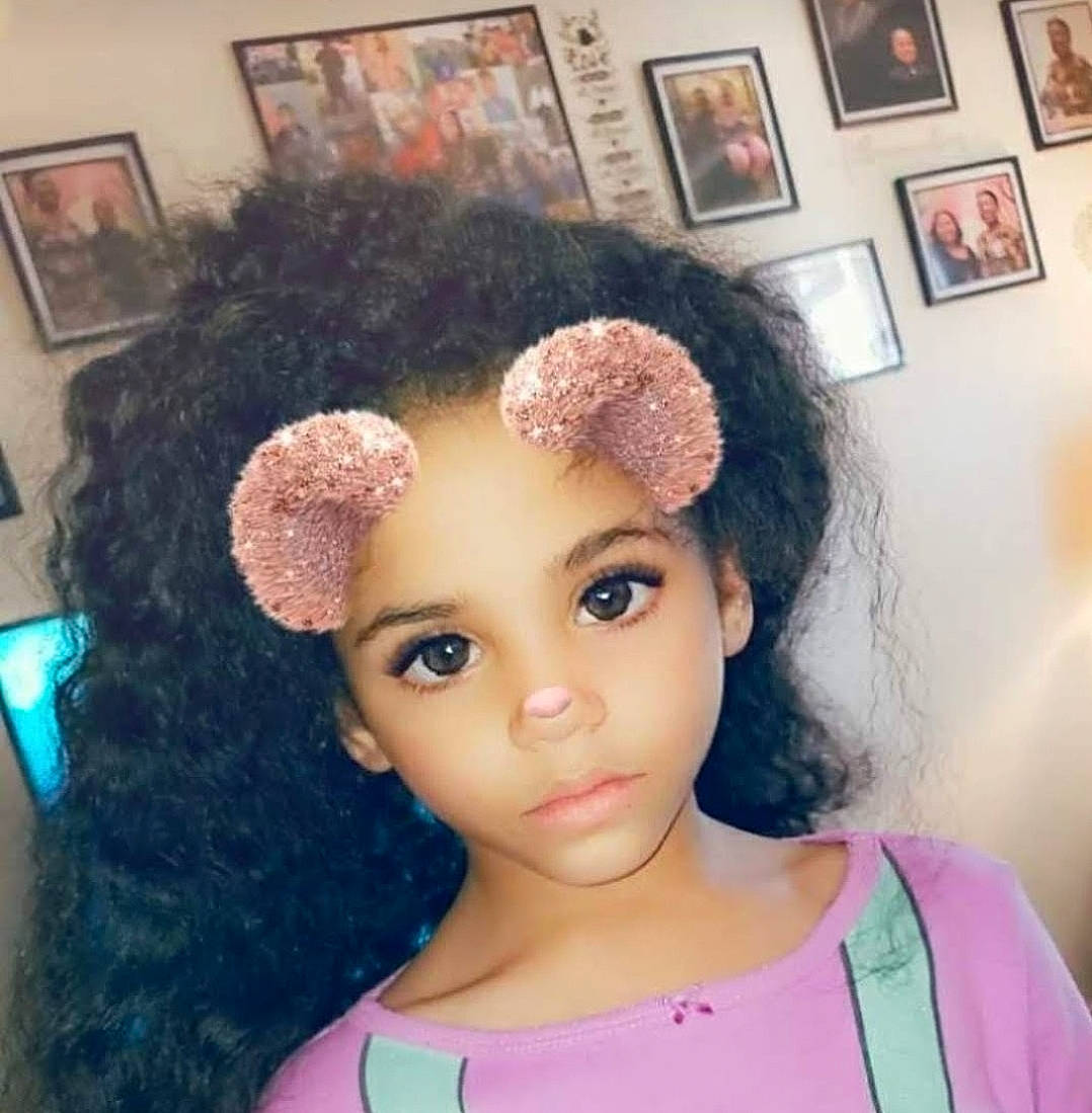 Iyanna is registered to the contest to win money with this photo: blurred, cap, chin, clothing, cool, dress, ear, eyebrow, eyelash, forehead, hair, happy, head, headgear, iris, lip, neck, nose, person, picture_frame