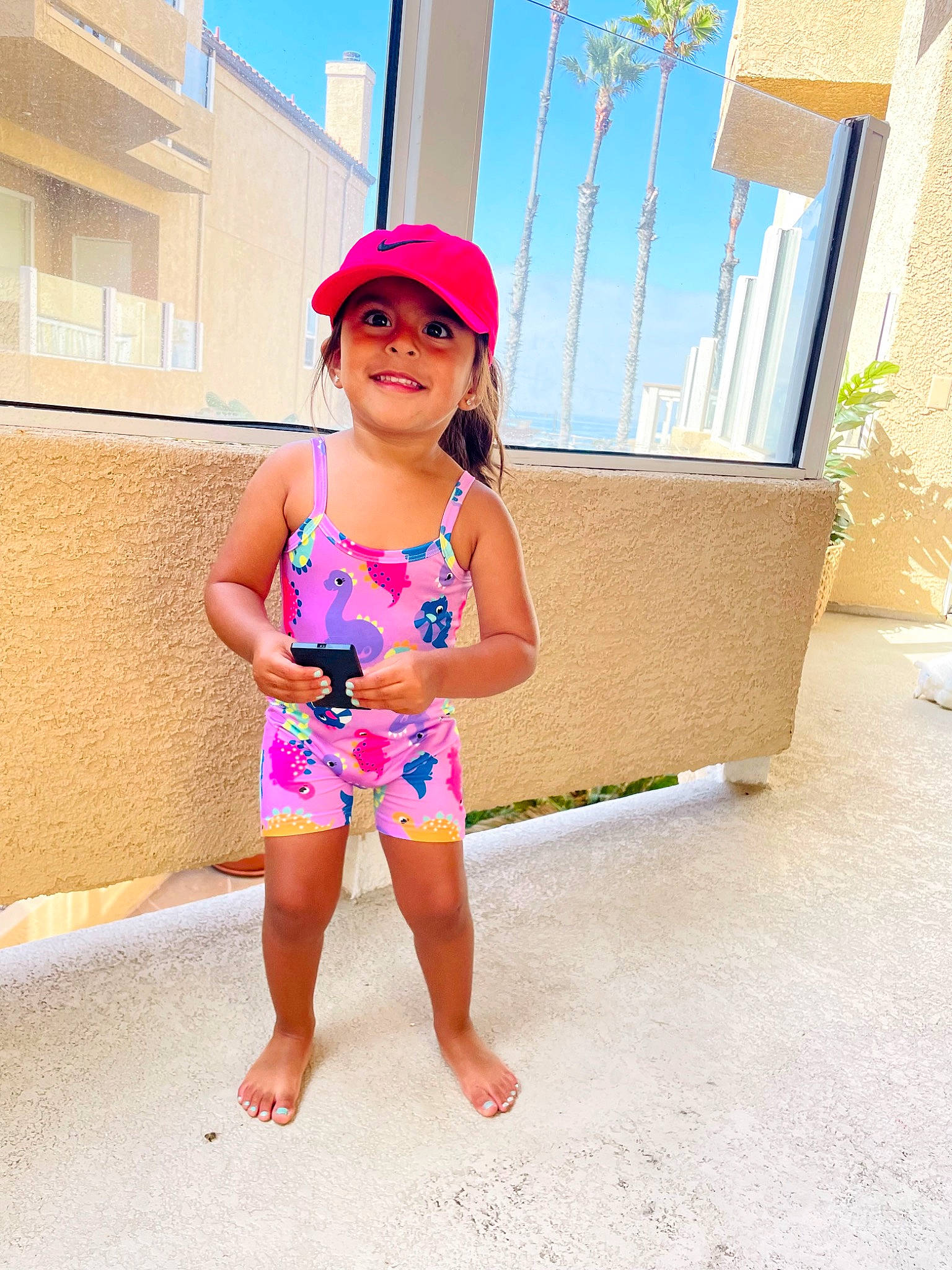 Alia joined the competition — help win amazing prizes! barefoot, clothing, eyewear, glasses, goggles, happy, hat, headwear, human_leg, joy, leisure, magenta, one_piece_swimsuit, person, pink, sky, sleeve, sunglasses, swimwear, thigh