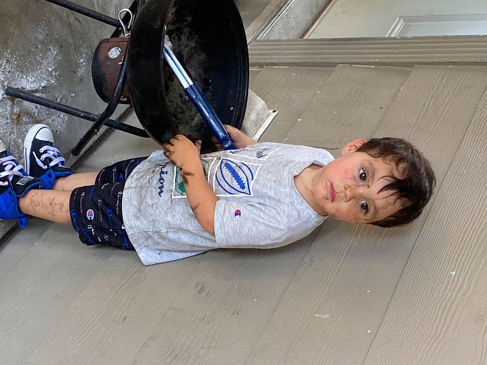 Brendon is registered to the contest to win money with this photo: audio_equipment, baby_toddler_clothing, child, electric_blue, flooring, fun, headgear, helmet, human_leg, knee, leg, leisure, person, personal_protective_equipment, sitting, sneakers, sports_gear, t_shirt, thigh, toddler