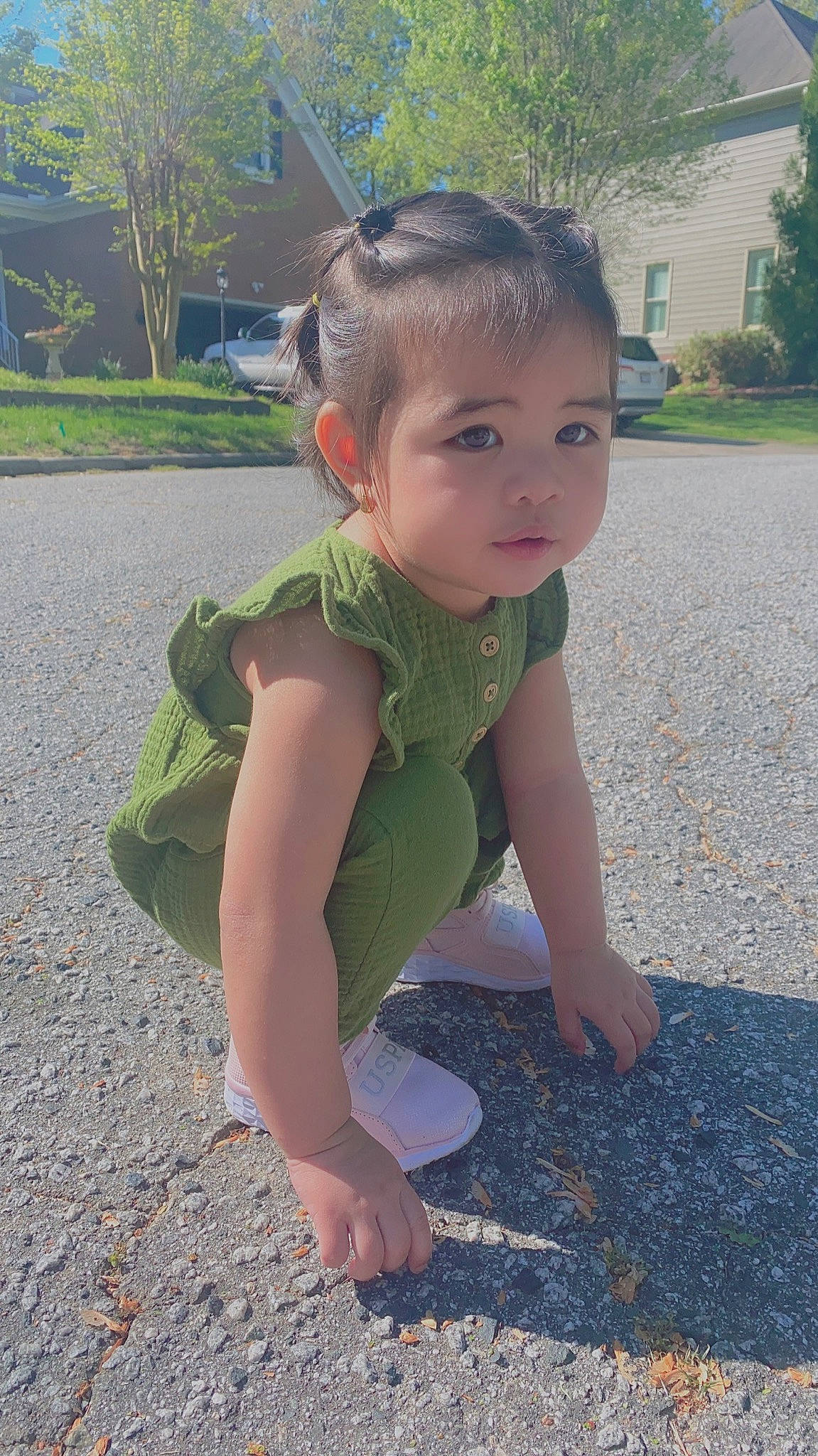 Katie joined the competition — help win amazing prizes! baby, baby_toddler_clothing, eye, fun, grass, hair, hairstyle, head, human_body, human_leg, lawn, leg, leisure, people_in_nature, person, plant, public_space, road_surface, thigh, toddler
