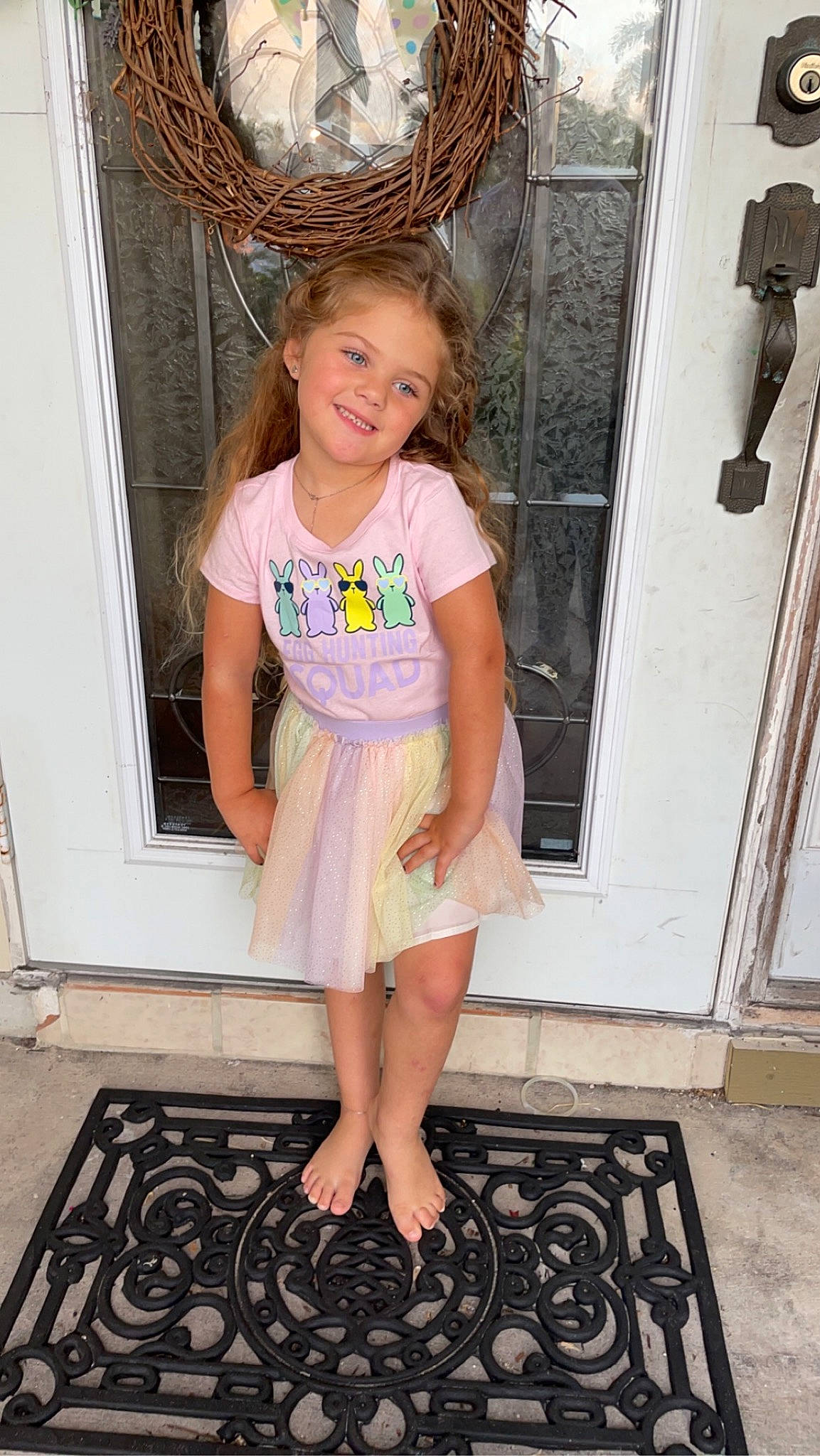 Alexis is registered to the contest to win money with this photo: child, door, flooring, foot, hair, happy, human_leg, joint, joy, knee, leg, magenta, person, pink, sleeve, smile, t_shirt, thigh, toddler, trunk