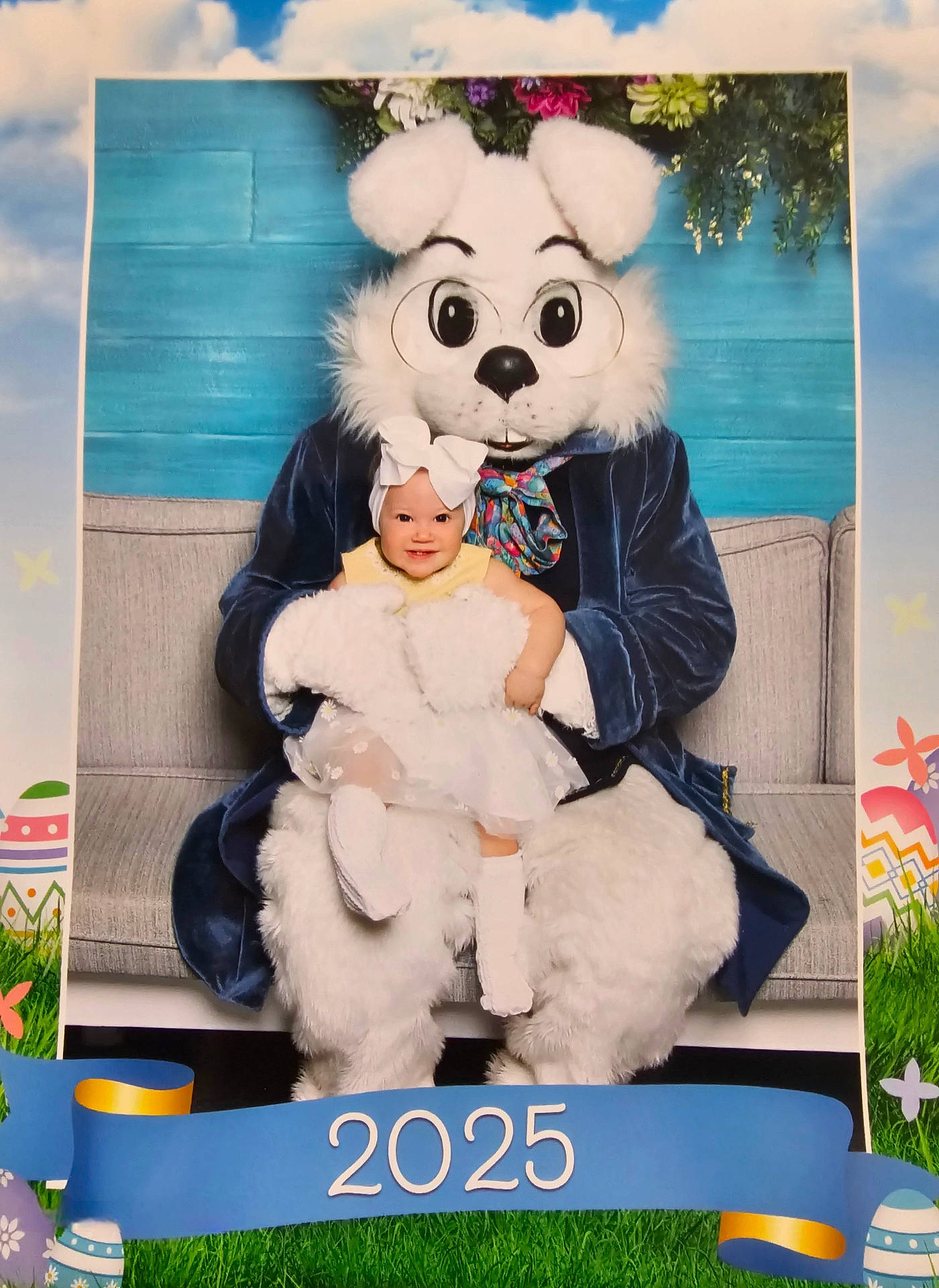 advertisement, baby, clothing, costume, couch, cushion, face, furniture, grass, head, homedecor, pants, people, person, photography, plant, plush, portrait, tape, toy