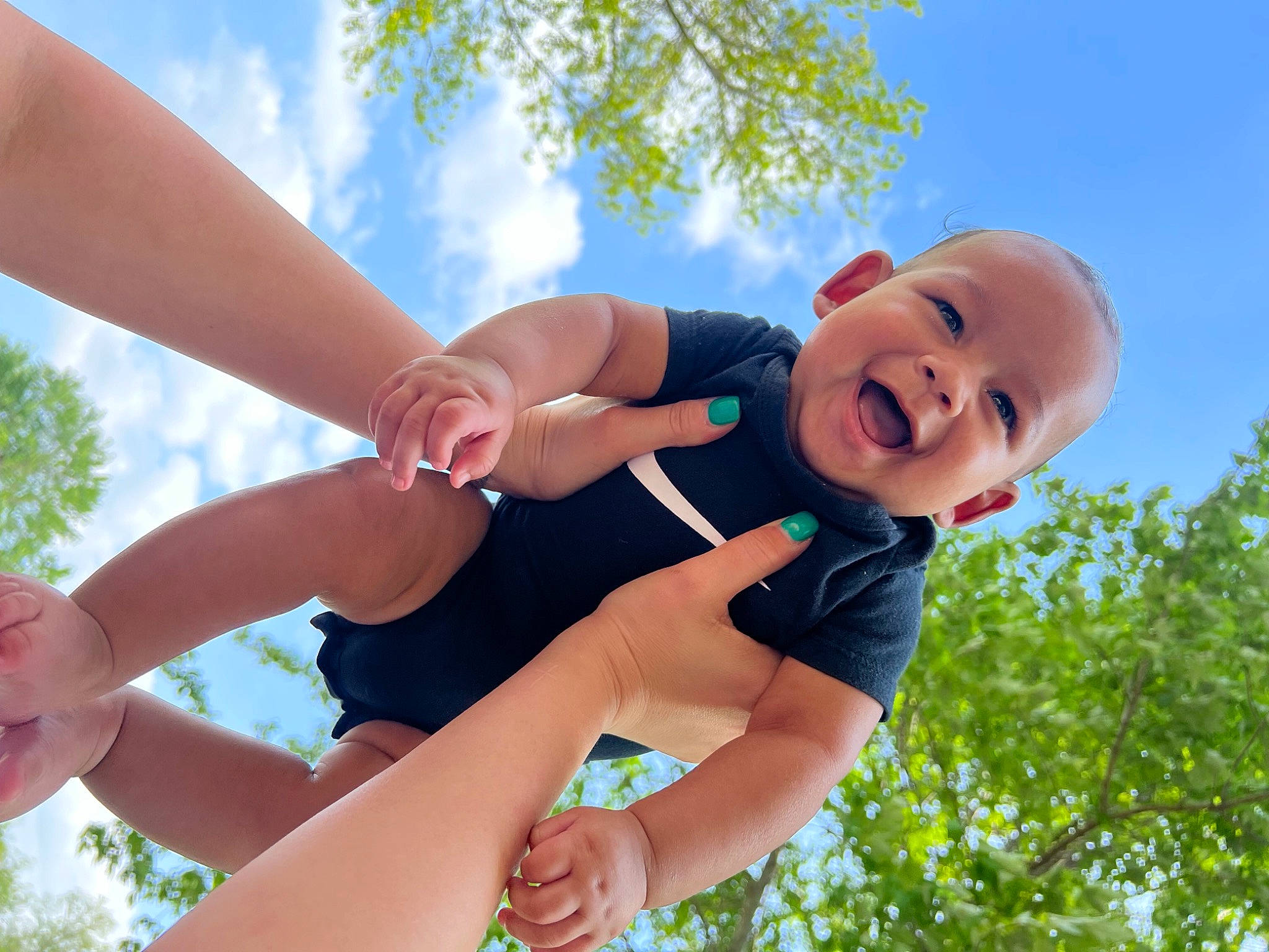 Espen joined the competition — help win amazing prizes! azure, cloud, daytime, facial_expression, finger, fun, gesture, grass, hand, happy, leisure, nature, people_in_nature, person, shorts, sky, smile, summer, sunlight, tree