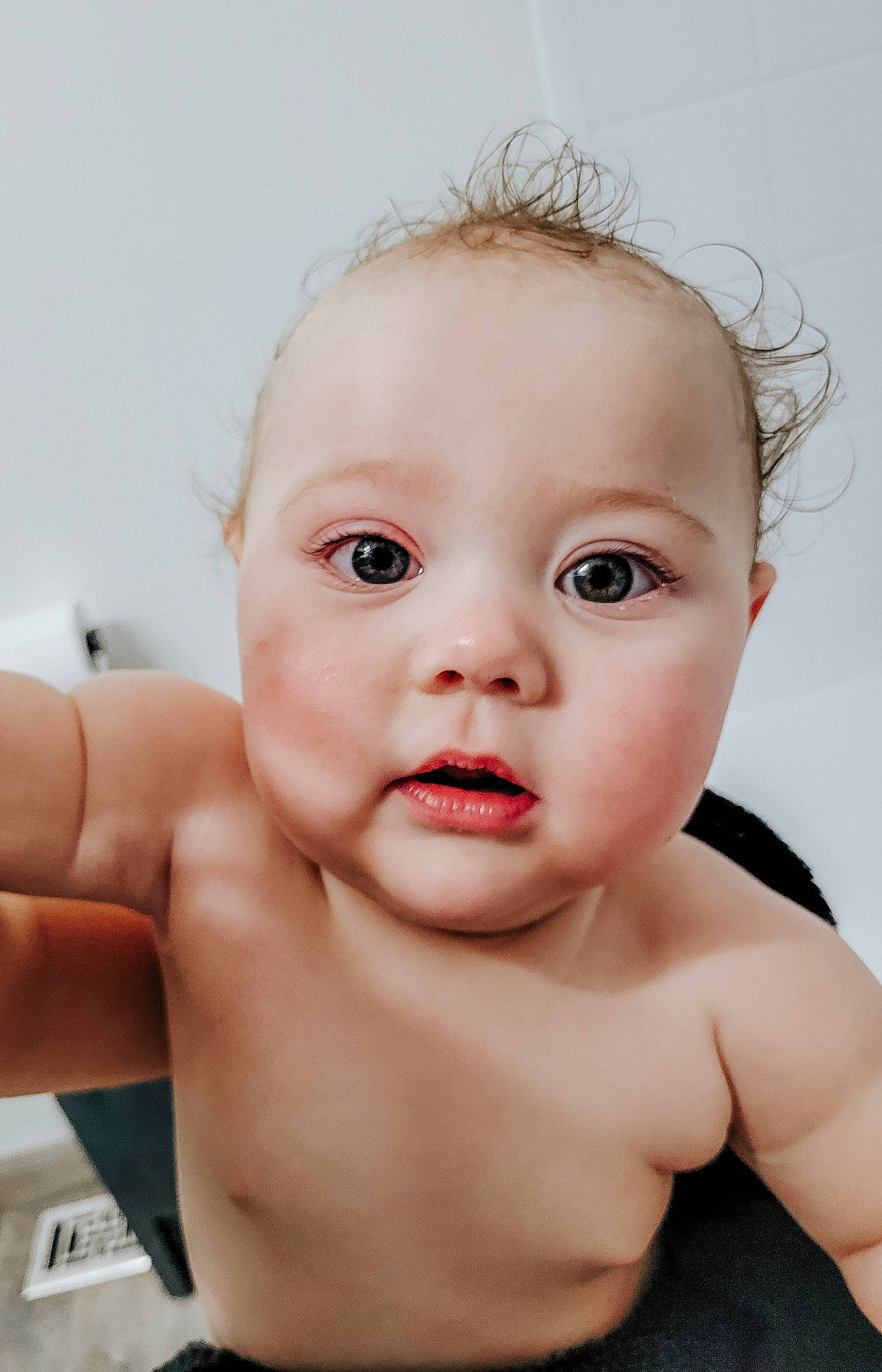 Aubrey is registered to the contest to win money with this photo: arm, cheek, ear, eye, eyebrow, eyelash, face, flash_photography, hand, head, human_body, iris, jaw, lip, mouth, neck, nose, person, shoulder, skin