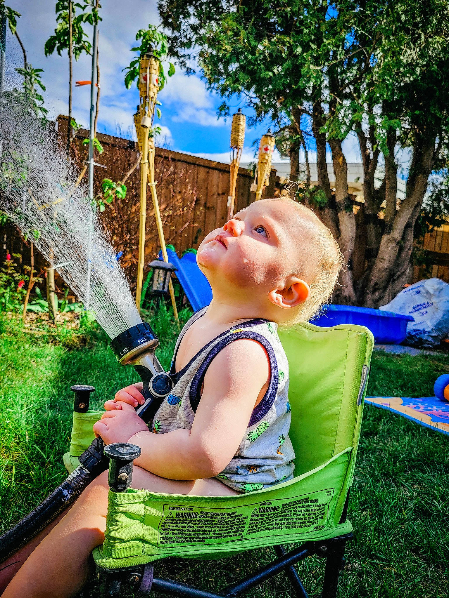 Liam joined the competition — help win amazing prizes! blue, chair, cloud, electric_blue, fun, grass, green, happy, lawn, leisure, people_in_nature, person, plant, recreation, sitting, sky, summer, swing, toddler, tree
