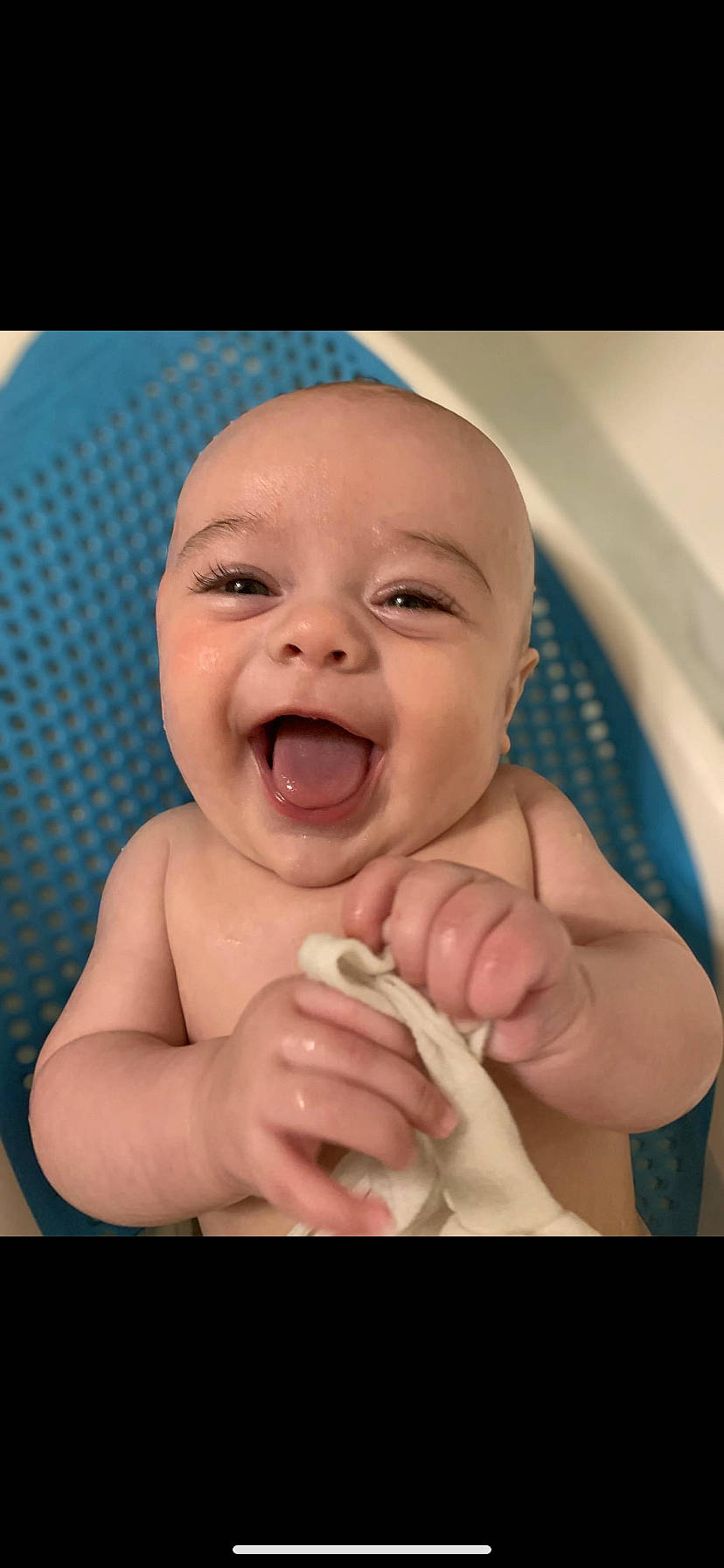 Violette is registered to the contest to win money with this photo: baby, baby_laughing, cheek, child, comfort, eyebrow, facial_expression, finger, gesture, happy, iris, lip, mouth, nose, person, pink, skin, smile, thumb, toddler