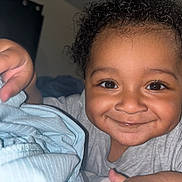 Silas is registered to the contest to win money with this photo: baby, babylaughing, bodypart, clothing, face, finger, hand, happy, head, indoors, laughing, mouth, newborn, person, photography, portrait, selfie, shoulder, smile, teeth