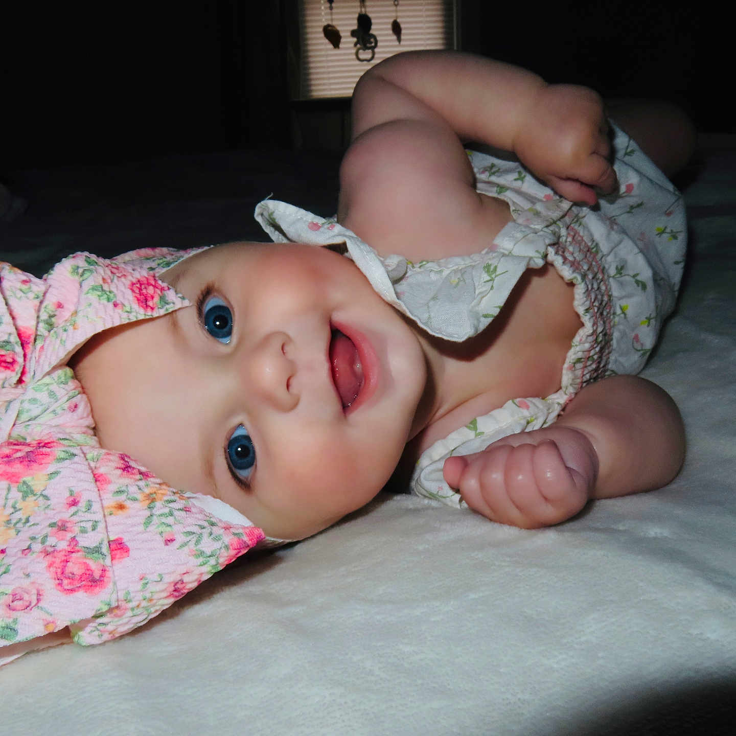 Sylvie Marie is registered to the contest to win money with this photo: baby, bed, bodypart, bonnet, cap, clothing, diaper, dress, face, finger, furniture, hand, happy, hat, head, newborn, person, photography, portrait, sunhat