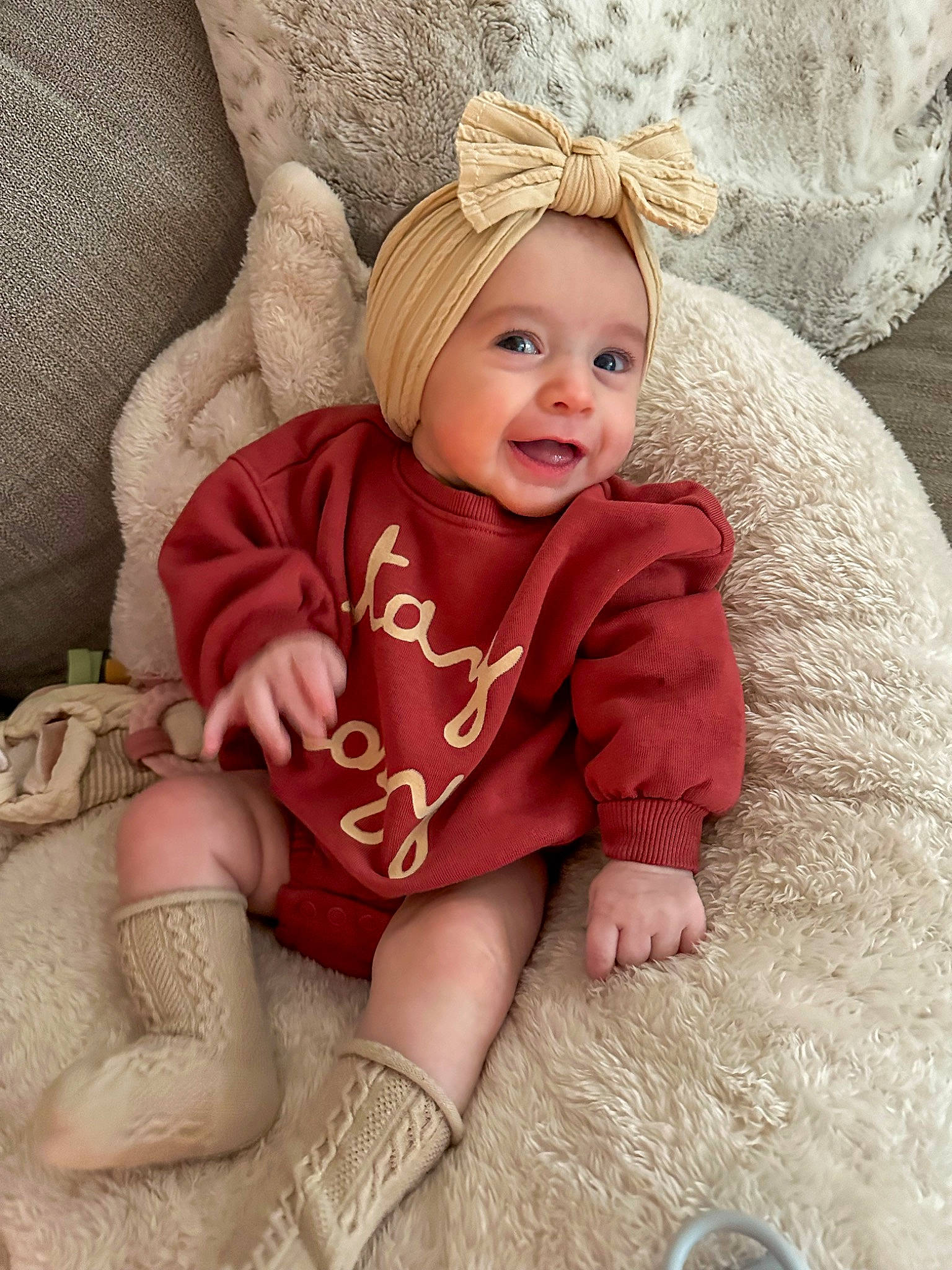 Giavanna is registered to the contest to win money with this photo: baby, baby_toddler_clothing, child, comfort, eye, face, happy, head, headgear, joy, knee, person, pink, skin, sleeve, smile, sock, textile, thigh, toddler