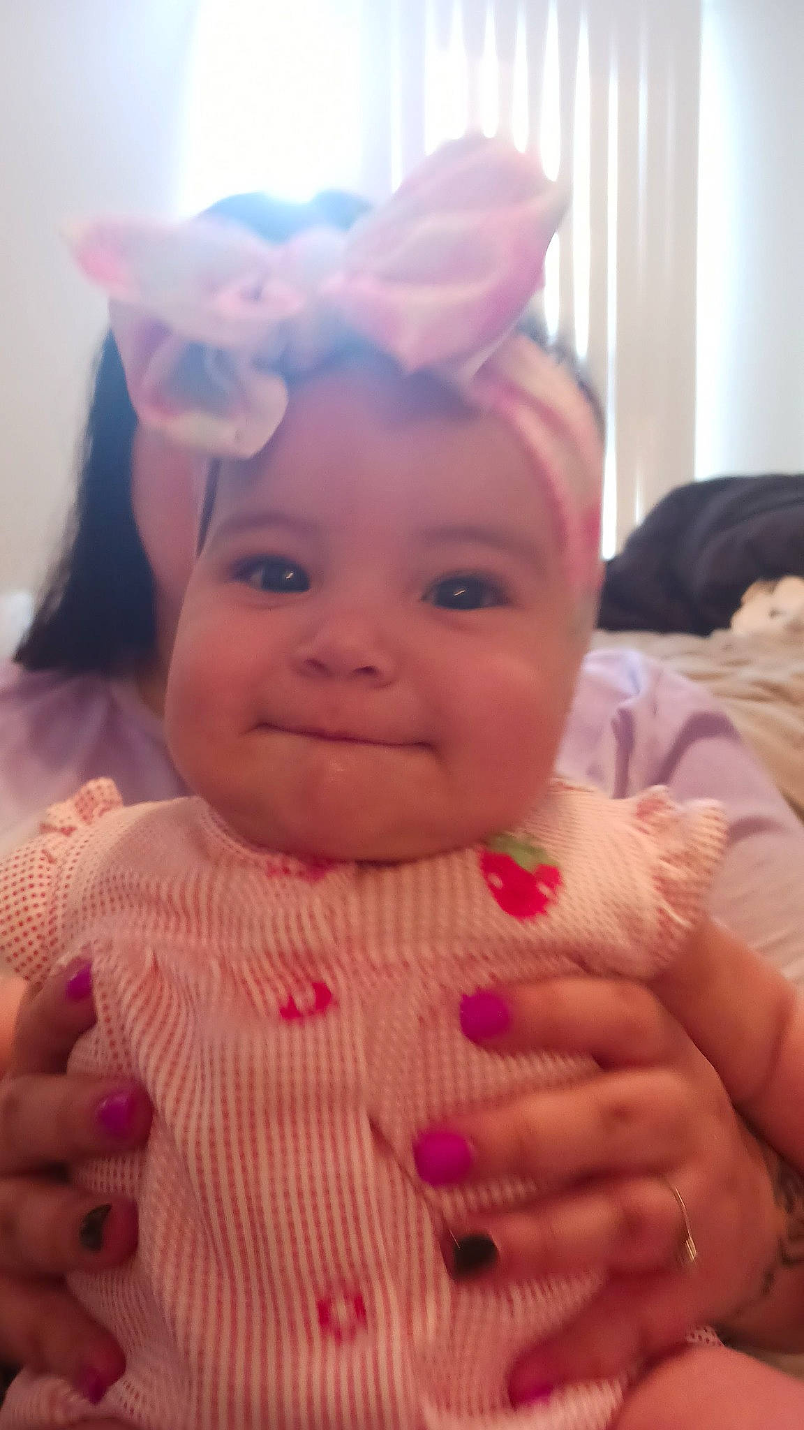 Celeste joined the competition — help win amazing prizes! baby, baby_toddler_clothing, cheek, chin, eye, eyebrow, finger, gesture, hand, happy, head, headwear, iris, joy, lip, mouth, nose, person, pink, skin