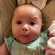 Nova is registered to the contest to win money with this photo: baby, bed, blanket, bodypart, clothing, crib, cushion, face, finger, furniture, hand, head, homedecor, infantbed, newborn, person, photography, portrait, quilt, t_shirt