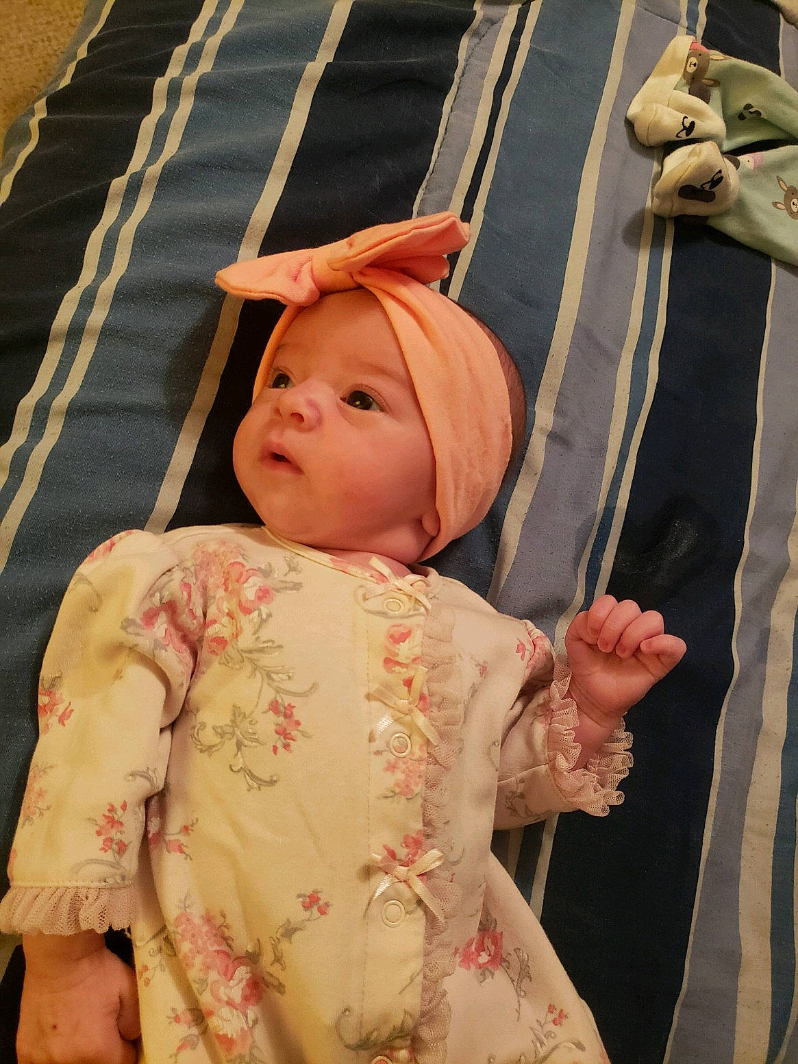 Eliza is registered to the contest to win money with this photo: child, eye, girl, headwear, infant, person, pink, skin, smile, textile, toddler