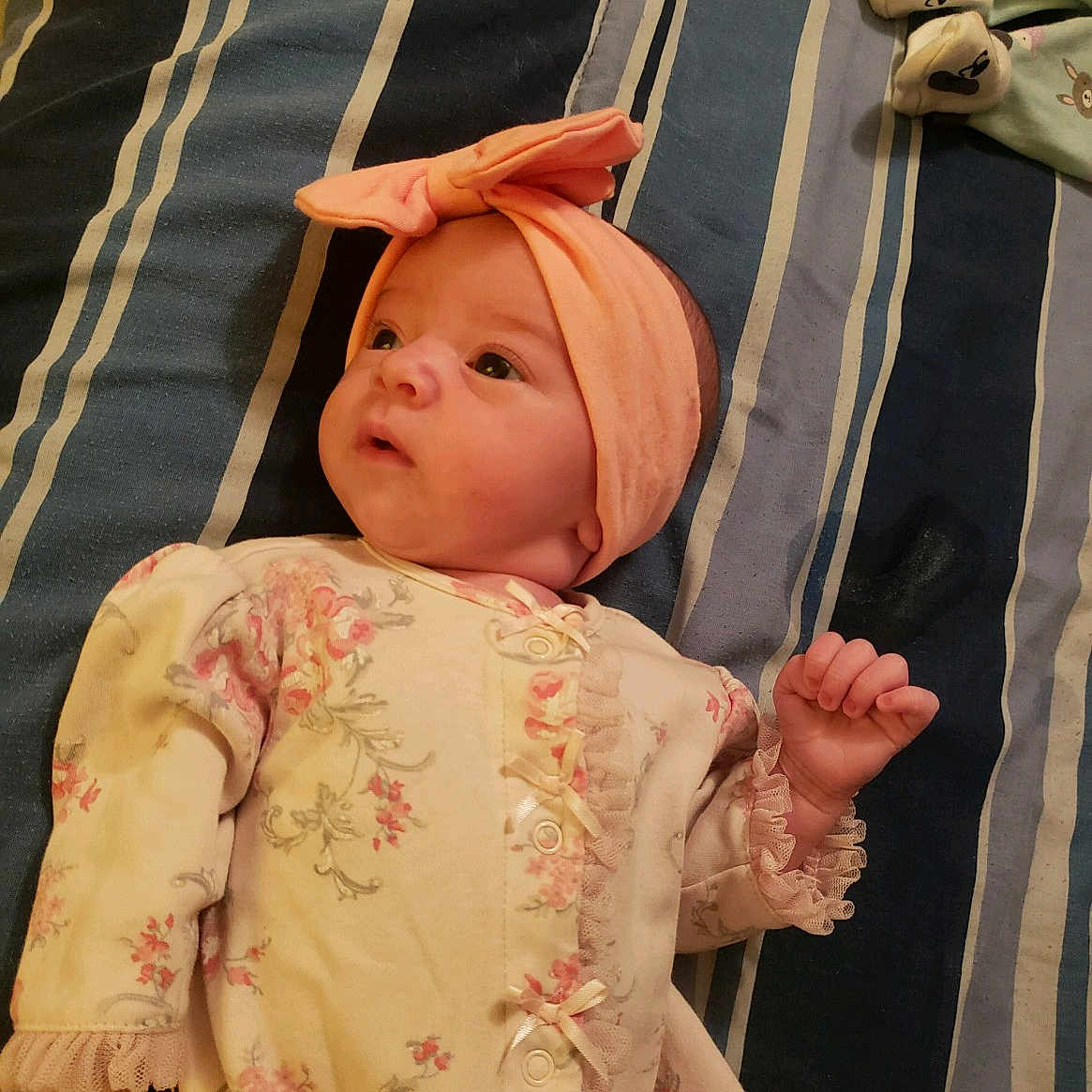 Eliza is registered to the contest to win money with this photo: child, eye, girl, headwear, infant, person, pink, skin, smile, textile, toddler