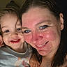 Chloe is registered to the contest to win money with this photo: child, woman, smile, happy, selfie, portrait, indoor, face, closeup, person, casual_clothing, rainbow, tank_top, joy, family, love, togetherness, skin, head, eyewear