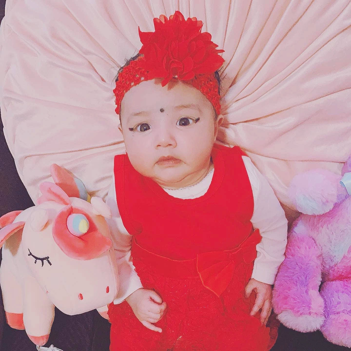 Emani joined the competition — help win amazing prizes! baby, baby_toddler_clothing, child, costume, costume_accessory, hair_accessory, headgear, headwear, peach, person, pink, toddler