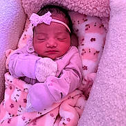 Milan is registered to the contest to win money with this photo: newborn, baby, sleeping, blanket, pink, mittens, headband, bow, soft, plush, cozy, infant, cute, peaceful, bed, portrait, child, resting, warm, indoor