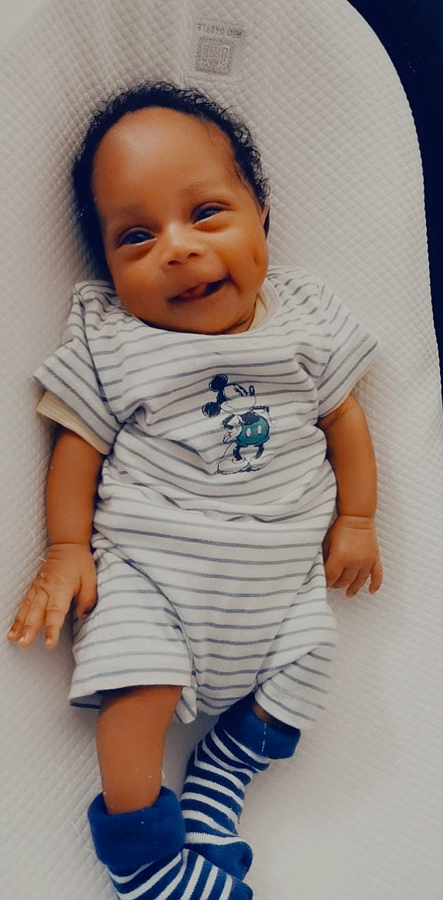 Raphaël participe au concours pour gagner de l'argent avec cette photo : baby, baby_toddler_clothing, child, collar, comfort, electric_blue, eye, face, gesture, happy, linens, nose, pattern, person, product, skin, sleeve, smile, t_shirt, toddler