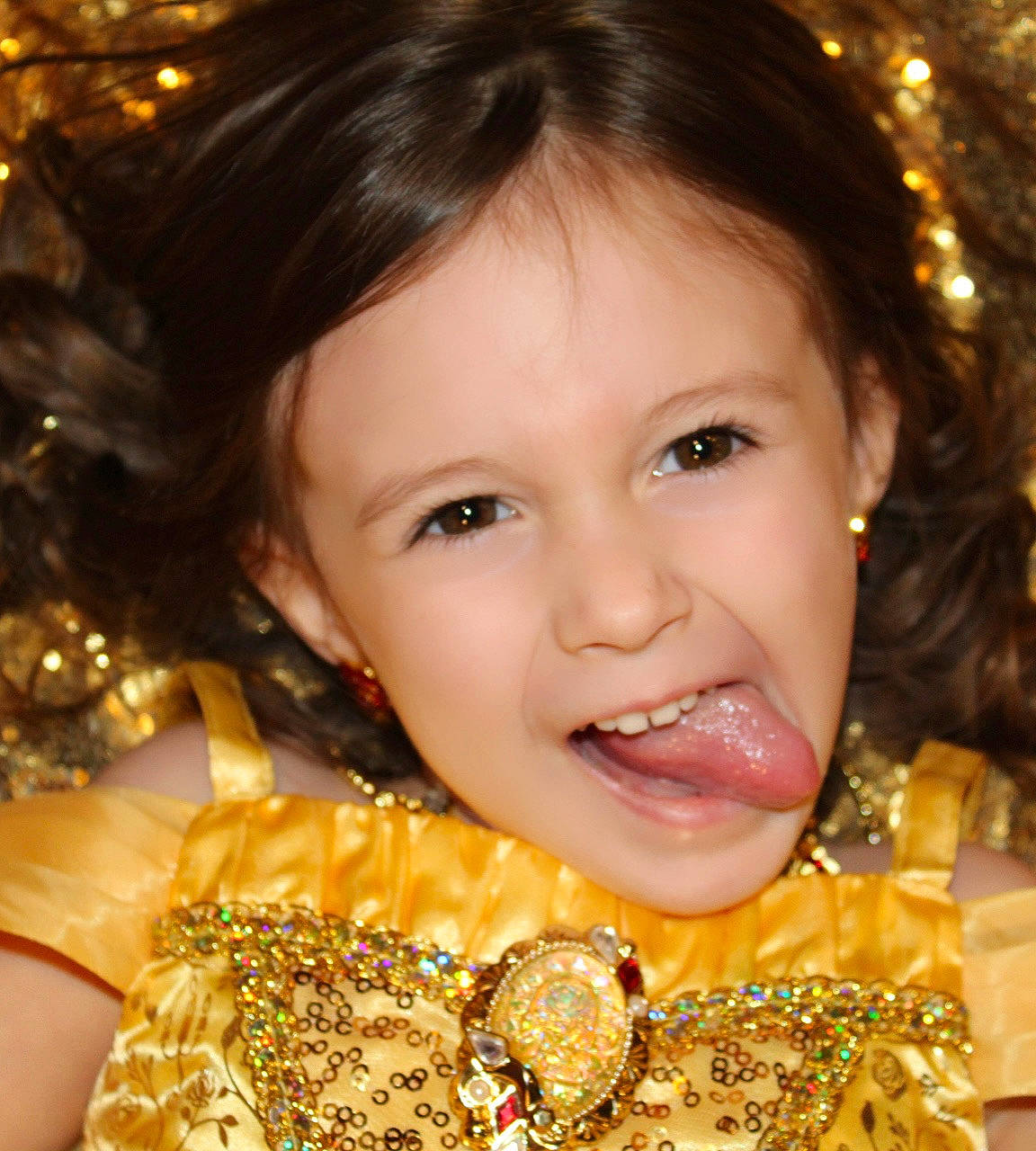 Zoey is registered to the contest to win money with this photo: beauty, black_hair, cheek, christmas_ornament, ear, eye, eyebrow, eyelash, finger, fun, hair, happy, iris, lip, long_hair, nose, organ, person, skin, smile