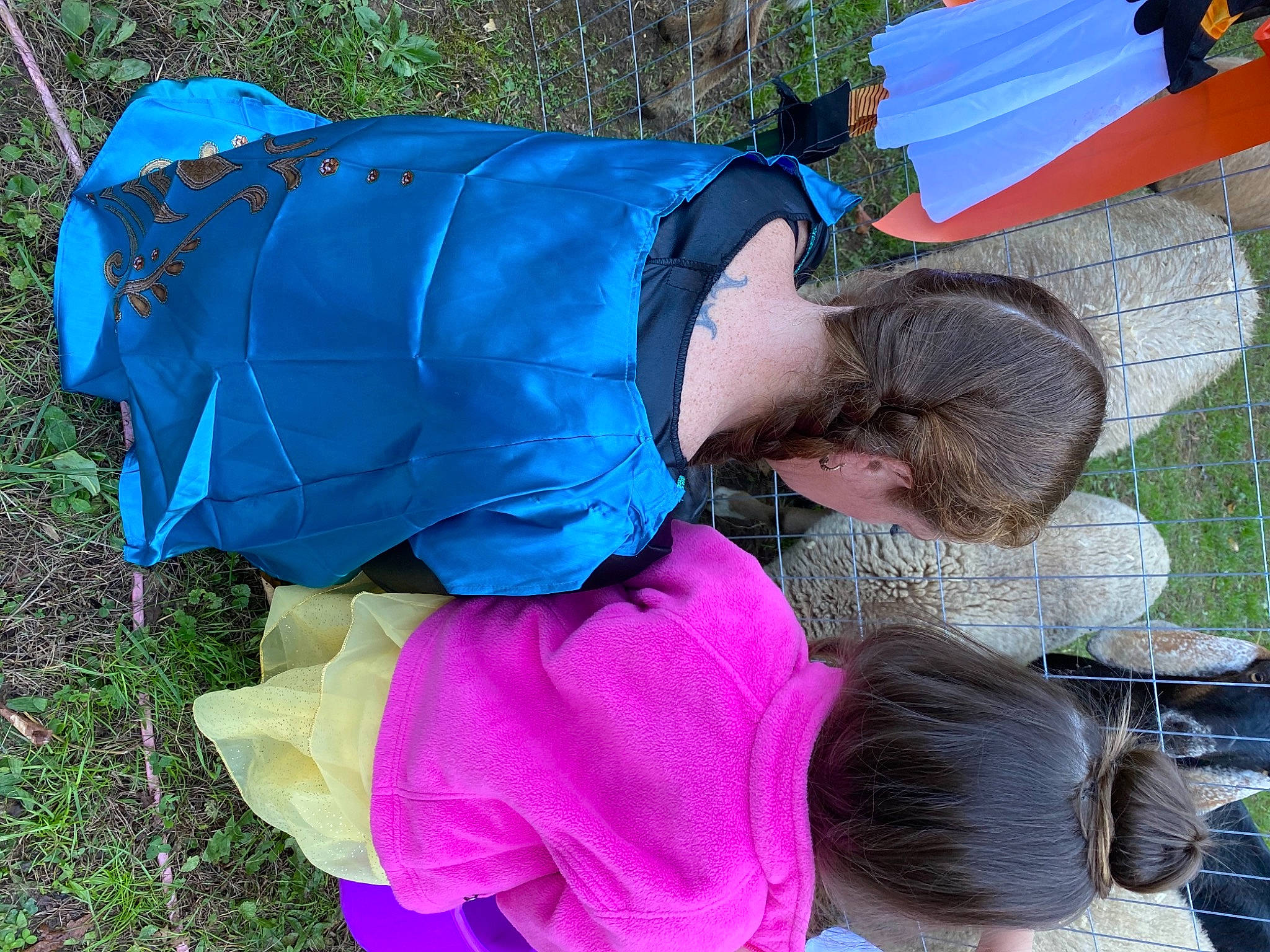 Zoey is registered to the contest to win money with this photo: child, costume, electric_blue, event, fun, grass, hat, leisure, magenta, organism, person, plant, recreation, tree