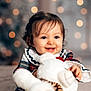 Margarida a rejoint le concours — aidez-le/la à gagner de superbes lots ! baby, babylaughing, bodypart, clothing, coat, eating, face, finger, food, hand, happy, head, hoodie, knitwear, person, photography, portrait, sitting, smile, sweater