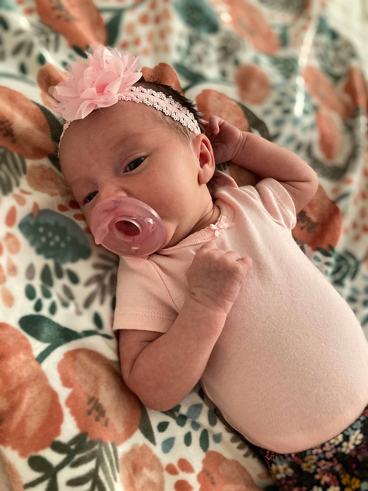 Aniya joined the competition — help win amazing prizes! baby, baby_toddler_clothing, cap, cheek, dress, eye, face, facial_expression, finger, grass, happy, headband, headgear, headpiece, human_body, lip, person, pink, skin, textile