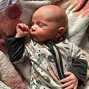Dominic is registered to the contest to win money with this photo: baby, sleeping, blanket, onesie, infant, soft, cozy, hand, face, newborn, peaceful, child, bed, texture, cute, skin, resting, warm, portrait, indoors
