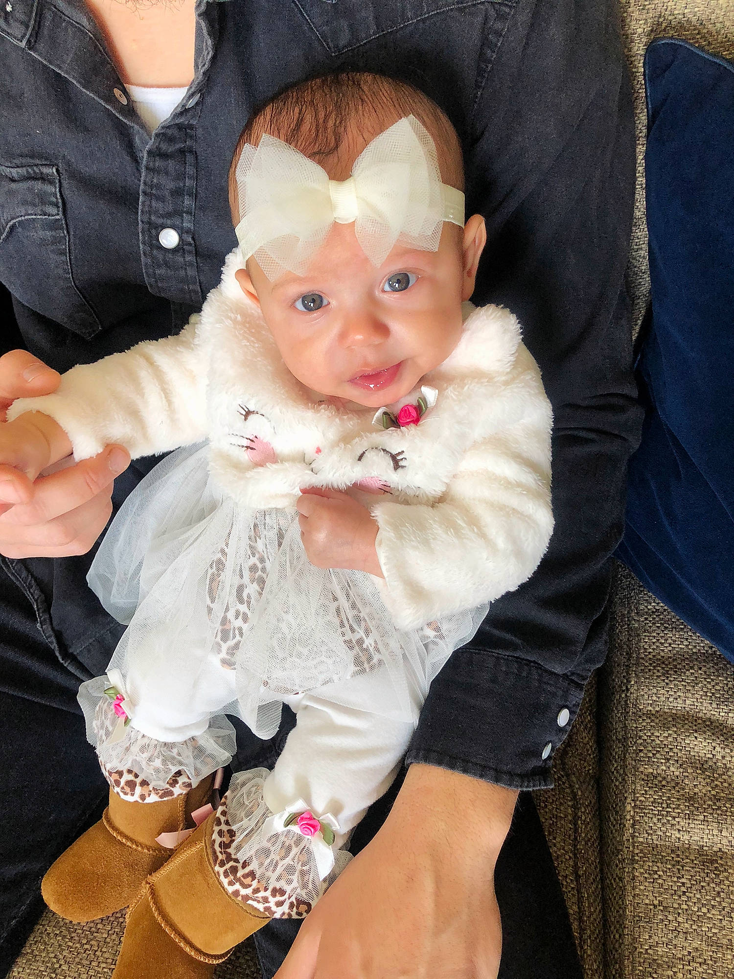 Nova is registered to the contest to win money with this photo: arm, baby, blond, cheek, child, dress, eye, face, finger, hand, head, iris, joint, leg, lip, people, person, pink, sitting, skin