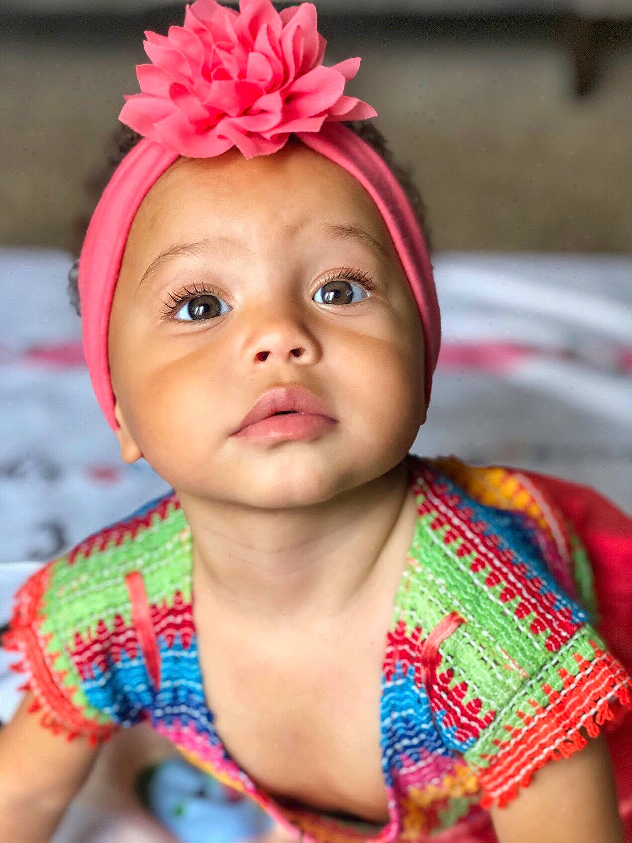 Nova is registered to the contest to win money with this photo: cheek, chin, cool, eye, eyebrow, face, forehead, happy, head, headgear, headwear, iris, lip, neck, nose, organ, person, pink, red, skin