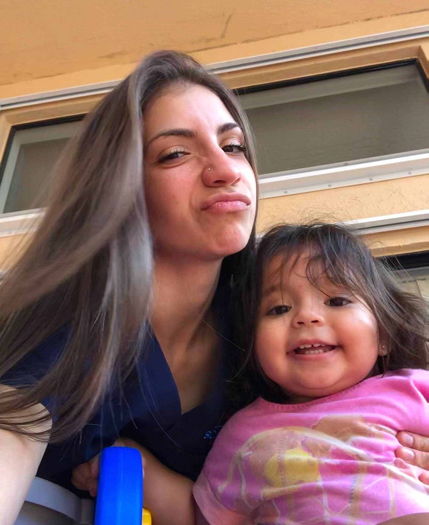 Madeline Rose is registered to the contest to win money with this photo: blond, child, event, eyebrow, face, fun, gesture, happy, iris, joy, leisure, lip, long_hair, mouth, person, sitting, skin, smile, summer, t_shirt