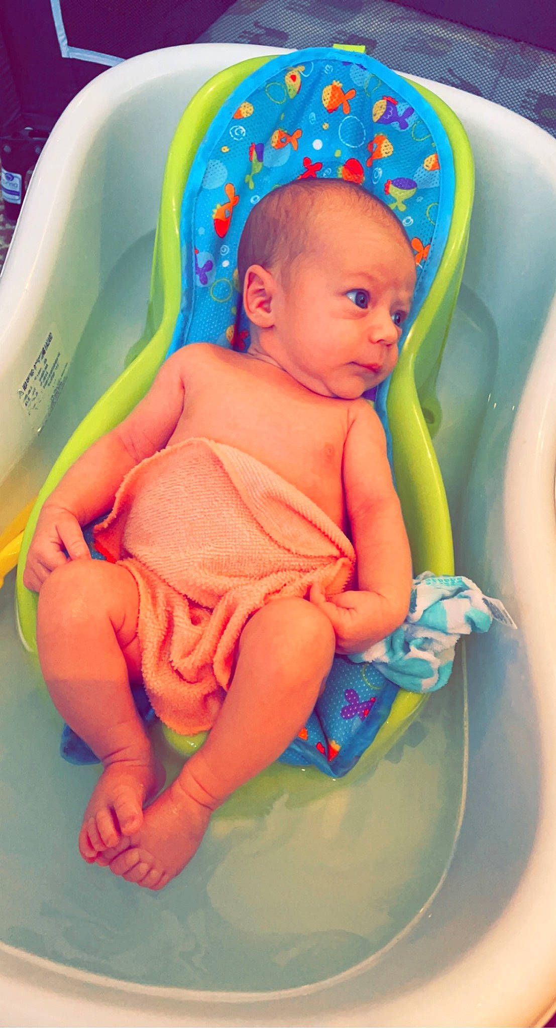 Clyde is registered to the contest to win money with this photo: aqua, baby, baby_products, baby_safety, baby_toddler_clothing, bathing, cheek, child, comfort, electric_blue, finger, fun, happy, head, leisure, mouth, person, pink, product, skin