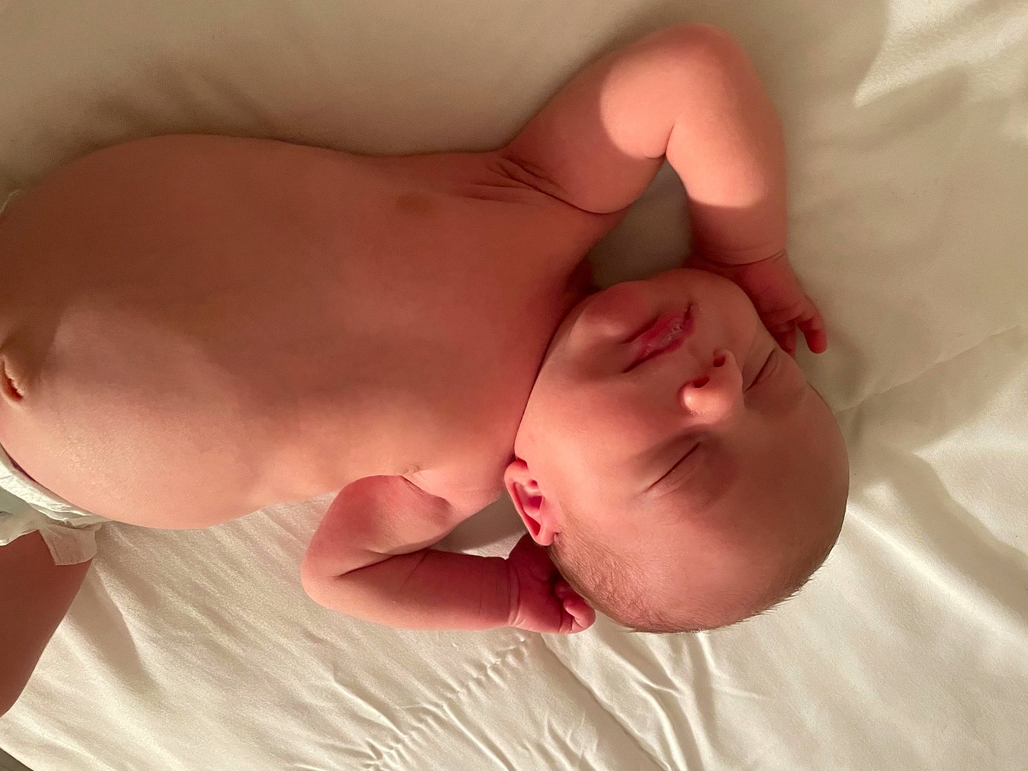 Clyde is registered to the contest to win money with this photo: abdomen, arm, baby, cheek, chest, comfort, face, finger, gesture, hair, hand, head, human_body, mouth, nail, neck, nose, person, skin, stomach