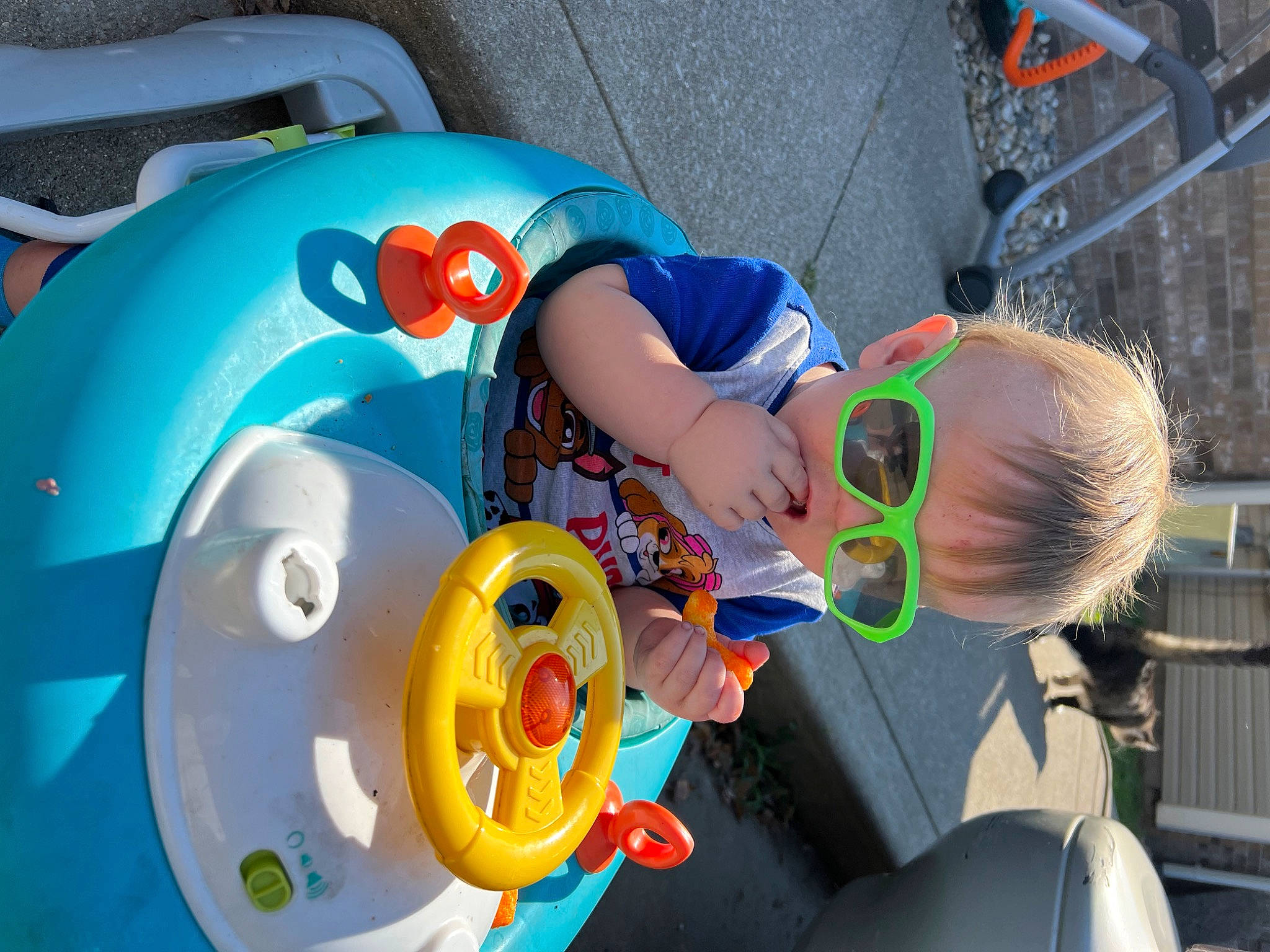 Wyatt is registered to the contest to win money with this photo: auto_part, automotive_tire, automotive_wheel_system, baby, blue, child, circle, electric_blue, eyewear, fun, goggles, leisure, person, personal_protective_equipment, product, recreation, sunglasses, toddler, toy, water