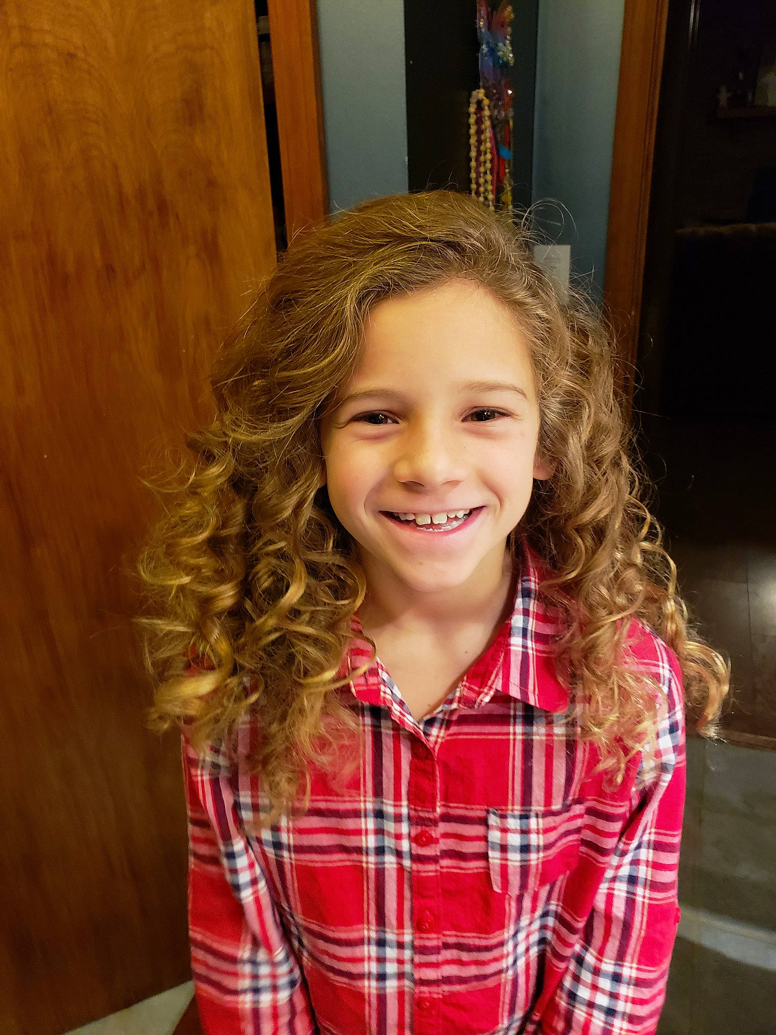 Koralyn joined the competition — help win amazing prizes! brown_hair, cheek, child, child_model, day, eye, facial_expression, girl, hair, hairstyle, happiness, human_hair_color, joy, long_hair, organ, pattern, person, plaid, smile, tartan